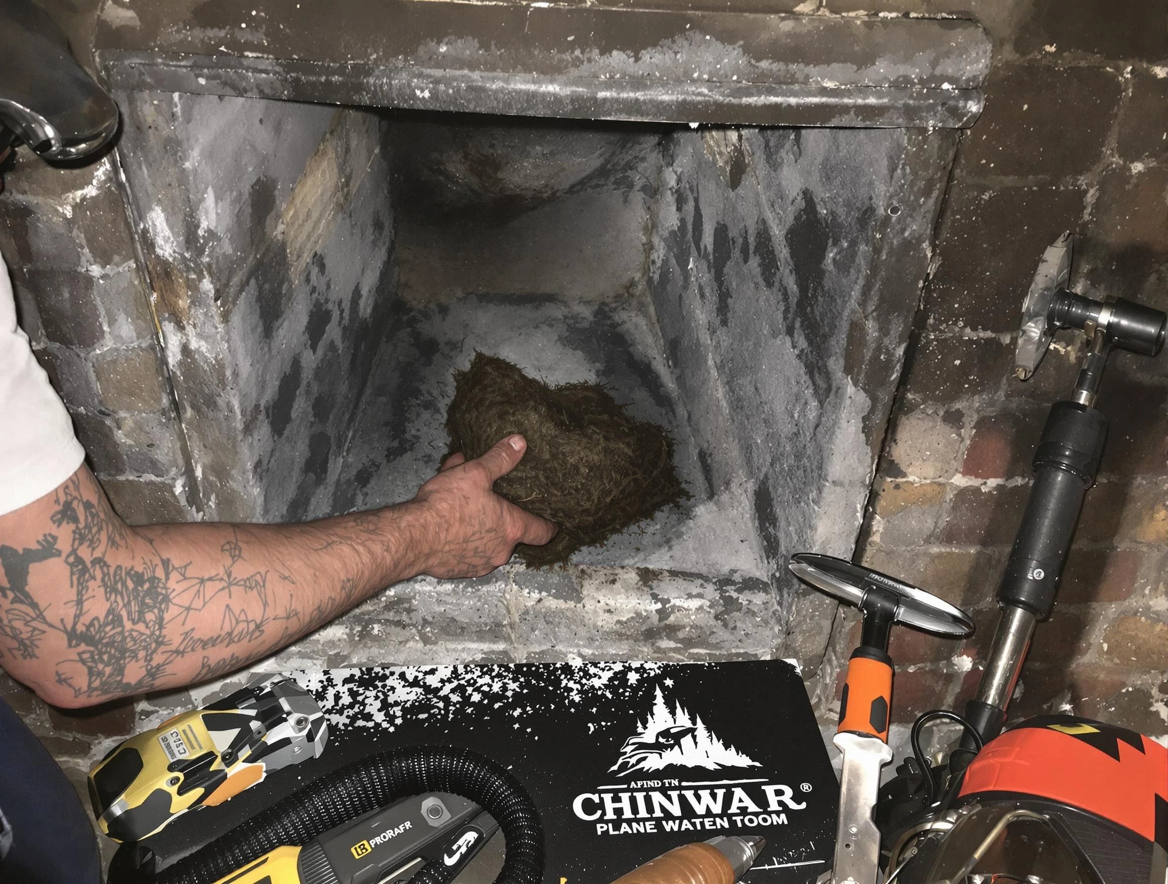 Hoover Chimney Sweep safely removing debris and screening chimney in Hoover, AL