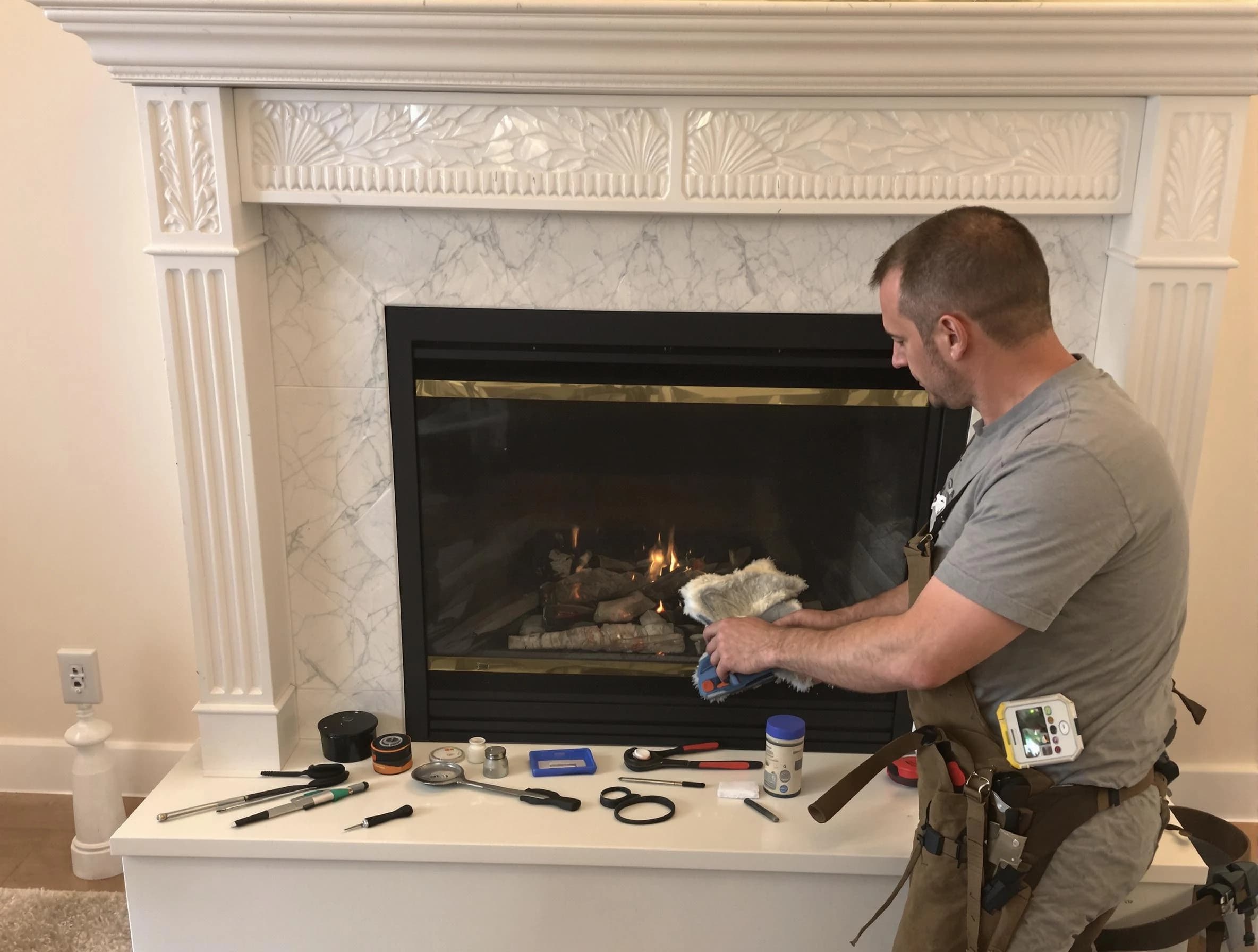Hoover Chimney Sweep performing fireplace maintenance in Hoover, AL